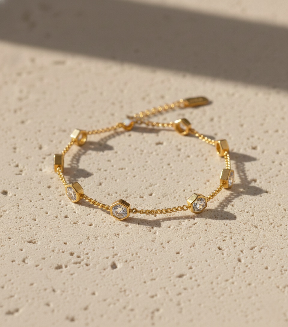 Hexagon CZ gold plated bracelet with minimalist chain design for women. Gold chain bracelet featuring hexagon crystal charms, elegant modern jewelry.