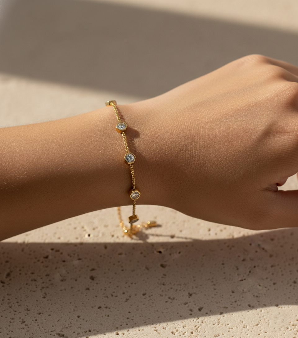 Stylish gold plated bracelet with geometric hexagon CZ stones for daily wear. Dainty adjustable gold bracelet with hexagonal crystal accents, lightweight jewelry