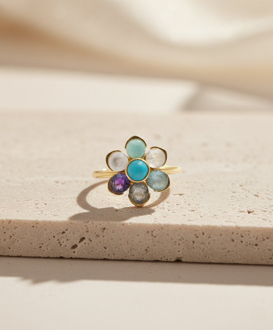gold plated flower ring with natural kyanite, sky blue topaz, rose quartz, garnet, green onyx, citrine, carnelian and zircon gemstones