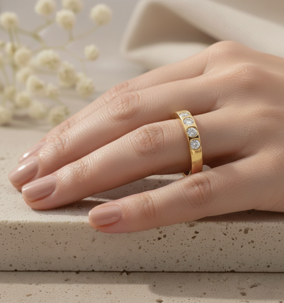 sleek gold half eternity band featuring round cz stones in bezel setting, premium finish from leading jewelry manufacturer in jaipur