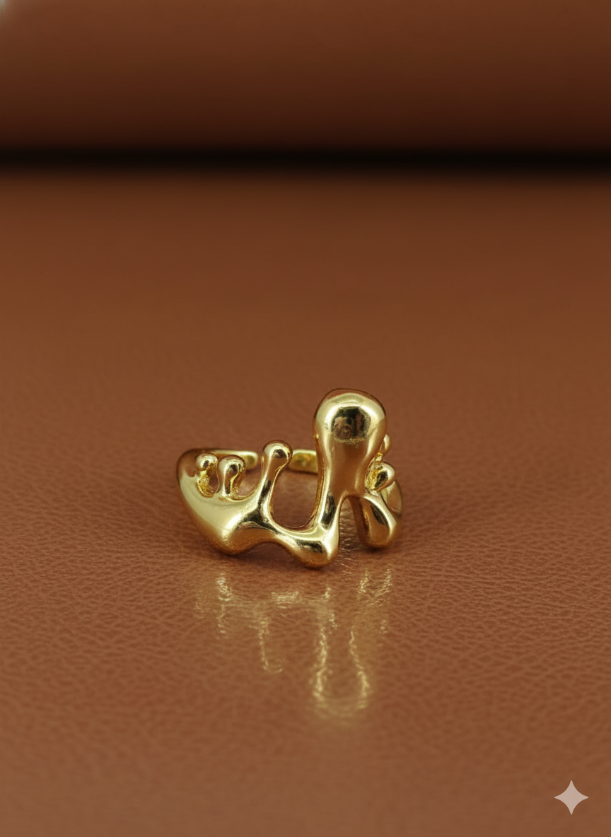 Dripping abstract sterling silver ring with fluid sculptural design, modern statement jewelry