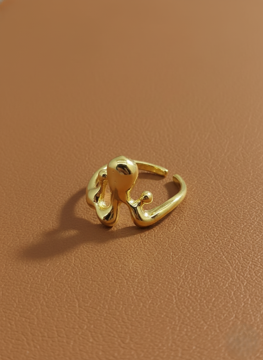 Abstract dripping silver ring featuring organic flowing form, contemporary minimalist jewelry