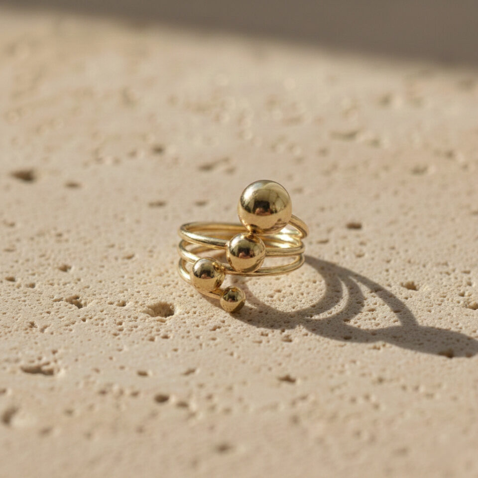 Trendy gold bubble ring with smooth rounded texture