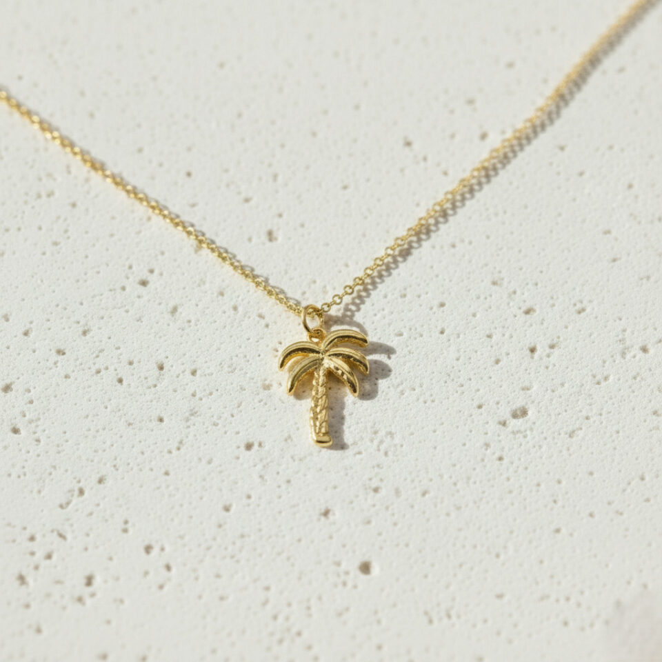 Minimal palm tree charm necklace in gold finish