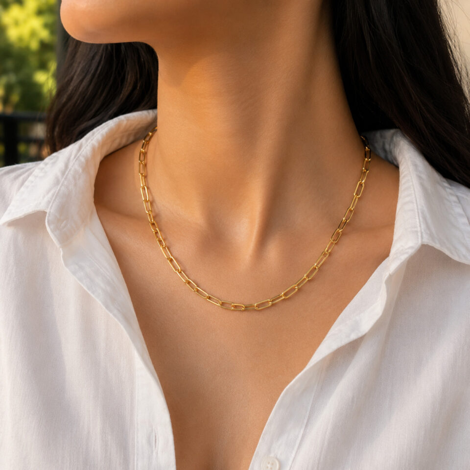 Lightweight silver paperclip necklace displayed on a clean neutral jewelry background.